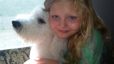9 year old Olivia and her Poodle Pele